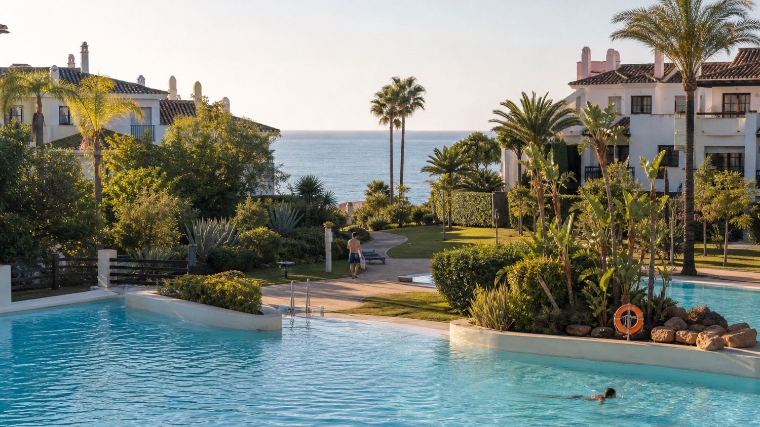 Year-round New Golden Mile lifestyle beside a large communal pool and the Mediterranean
